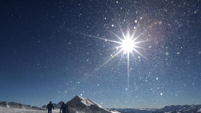 Skiers crest a mountain near the start of the men’s downhill ski course in Krasnaya Polyana, Russia, on February 3, 2014, ahead of the 2014 Winter Olympics. Alessandro Trovati / AP Photo