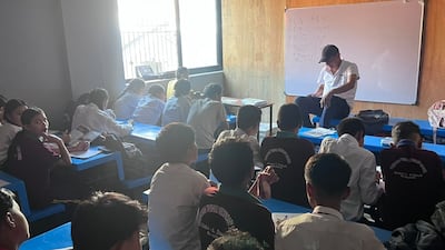 Pupils say studying is tough in the new makeshift facilities but they are grateful to go back to school. Photo: Rajendra Dawadi
