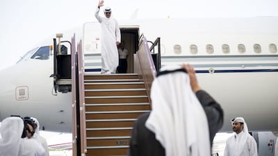 Sheikh Mohamed greets Sheikh Tamim. Wam