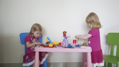 Nicki Houston’s twins, Jaida and Kenna, play at their home. Mona Al Marzooqi / The National