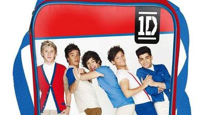 Good enough to eat: A nifty little lunch bag that is as practical as it is pretty – the insulation keeps your food hot or cold, the lining is wipeable for easy cleaning and the lid comes with an image of all five singers. £6.99 (Dh38) from www.onedirectionstore.com. Courtesy of one Direction