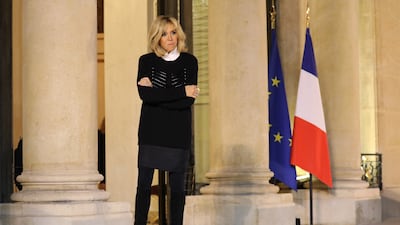Brigitte, wearing a black jumper over a white shirt, with a black skirt and boots, on November 20, 2017. AFP