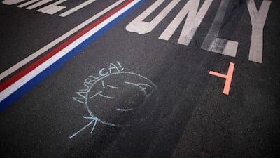 A chalk drawing that reads ''Murica!' on the track. AFP