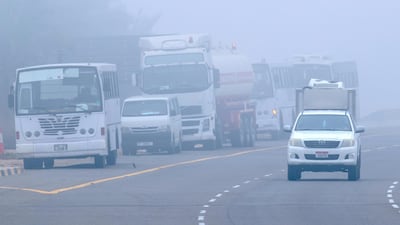 Drivers of large vehicles keep to the slow lane during poor driving conditions in Abu Dhabi. Victor Besa / The National.