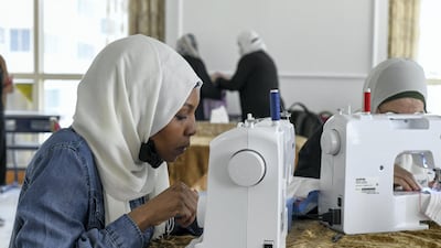 Hawa Hamed, originally from Chad, arrived to Abu Dhabi two years ago and is mastering the art of sewing