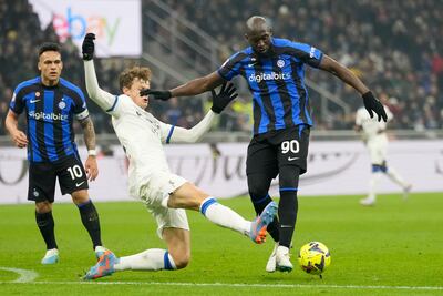 Inter Milan striker Romelu Lukaku is challenged by Atalanta's Giorgio Scalvini during the Coppa Italia quarter-final at the San Siro, on January 31, 2023. AP