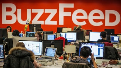 Buzzfeed employees work at the company's headquarters in New York in 2014. The company is close to a deal to go public, with an announcement expected as early as this week. Reuters.