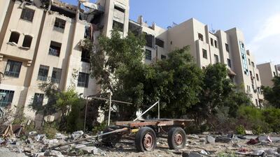 The damaged building where the Aziz family's apartment was hit by an Israeli airstrike in July in the Sheikh Zayed City neighbourhood of Gaza. Heidi Levine for The National