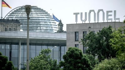 To mark the tunnel opening, huge letters reading "Tunnel" were erected on the embassy of Switzerland in Berlin, Germany. Michael Kappeler / EPA
