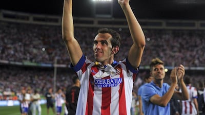 Atletico Madrid defender Diego Godin celebrates their victory for the Spanish Super Cup on Friday over Real Madrid. Dani Pozo / AFP