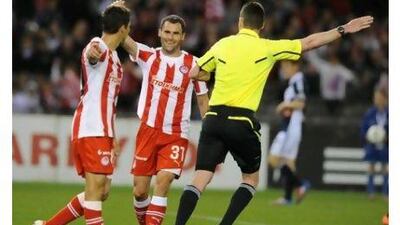The financial crisis in Greece has forced even defending Super League champion Olympiakos, in red and white, to look inwards at local talent rather than the foreign transfer wire.