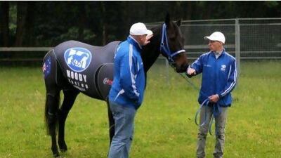 Black Caviar with trainer Peter Moody, left.