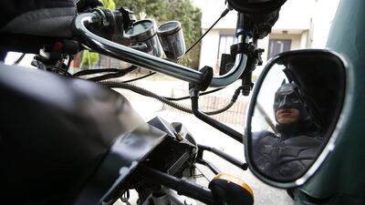 However, unlike the hero from the Batman series, he rides around in his machine, designed from inspiration of the Batpod from the movies The Dark Knight and The Dark Knight Rises, delivering smiles instead of fighting crime.