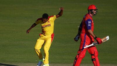 Krishmar Santokie of Sagittarius Strikers celebrates after taking the wicket of Justin Kemp for a hat-trick on Friday in the Masters Champions League. Francois Nel / Getty Images