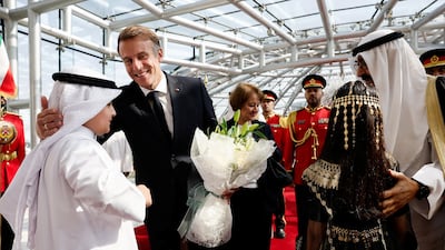 Sheikh Meshal, Emir of Kuwait, welcomes French President Emmanuel Macron at Kuwait International Airport. Reuters