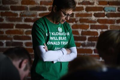 Campaign volunteer Andrea Kaufman stands inside Mile High Station where Democratic presidential candidate Amy Klobuchar cancelled a rally after dropping out of the presidential race in Denver, Colorado. AFP