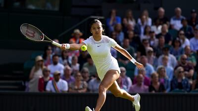 Emma Raducanu returns against Alison Van Uytvanck. PA