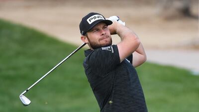 England's Tyrrell Hatton plays his second shot on the 2nd hole. Getty