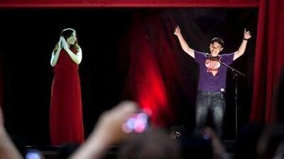 A reader applauds the holographic appearance of Lebanese singer Yara in Dubai. Silvia Razgova / The National