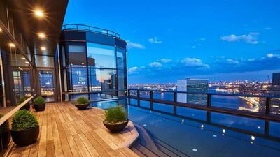 The penthouse at 50 United Nations Plaza offers sweeping vistas of the East River, UN Secretariat, the Empire State Building and Chrysler building. Courtesy Anastassios Mentis