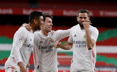 Nacho Fernandez, right, scored the only goal of the game against Athletic Bilbao to keep Real Madrid two points behind Atletico Madrid heading into the final game of the season. EPA