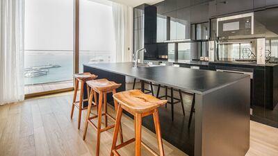 The kitchen has a handy breakfast bar.