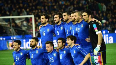 Italy's team players pose before the friendly football match between Italy and Spain at "Friuli-Dacia Arena" Stadium in Udine on March 24, 2016. AFP / GIUSEPPE CACACE