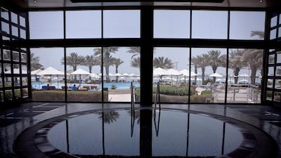 Hilton Abu Dhabi, above, undertook a Dh8 million land reclamation project to increase the size of its beach. Silvia Razgova / The National