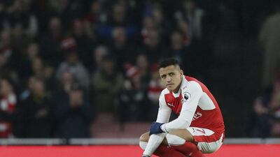 Arsenal's Alexis Sanchez looks across the pitch before last weekend's match against Stoke. Tim Ireland / AP Photo / December 10, 2016