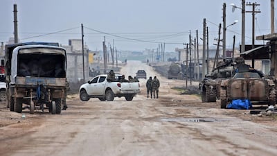 Syrian army soldiers advance in Tall Touqan village, in Syria's northwestern Idlib province, about 45 kilometres southwest of Aleppo AFP