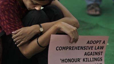 An activist in a sit-in demonstration on June 25, 2016, against recent so-called 'honour killings' in India. Manish Swarup / AP
