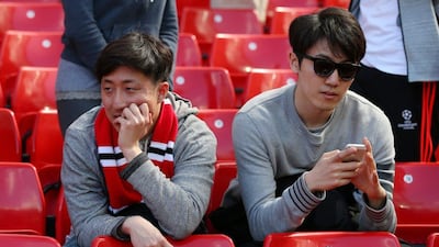 MANCHESTER, ENGLAND - MAY 15: Fans wait in the ground as parts are evacuated shortly before the game was abandoned prior to the Barclays Premier League match between Manchester United and AFC Bournemouth at Old Trafford on May 15, 2016 in Manchester, England. (Photo by Alex Livesey/Getty Images)