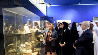 An Iraq Museum official points out exhibits to the UAE Minister of Culture and Knowledge Development Noura Al Kaabi during a tour on April 23, 2018. Wam