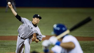 New York Yankees starting pitcher Masahiro Tanaka, left, gave up a home run to the first batter he faced, Toronto's left fielder Melky Cabrera, right, on Friday, April 4, 2014. But the Japanese ace kept his cool to strike out eight over seven innings to record the win for the Yankees. Nathan Denette / AP Photo
