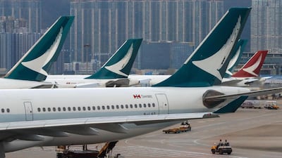 Cathay Pacific Airways planes park at the Hong Kong International Airport. AP