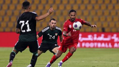 UAE's Ruben Canedo and Bahrain's Ebrahim Al Khatal during the game at Al Wasl Stadium, Dubai. All pictures by Chris Whiteoak / The National