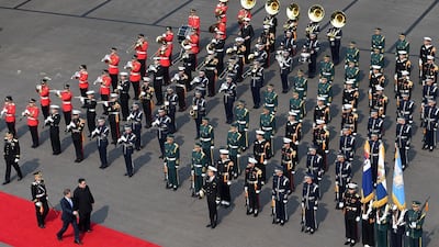 South Korean president Moon Jae-in attends a welcome ceremony with North Korean leader Kim Jong-un. Korea Summit Press Pool / Pool via Reuters