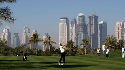 Robert Karlsson of Sweden hits a shot on the 13th hole during the second round of the Dubai Desert Classic golf tournament January 31, 2009. REUTERS/Ahmed Jadallah (UNITED ARAB EMIRATES) *** Local Caption *** AJS16_GOLF-_0131_11.JPG