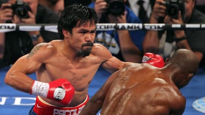 Manny Pacquiao goes on the attack against Timothy Bradley in 2012. Getty