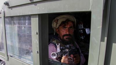Taliban forces rally to celebrate the withdrawal of US forces in Kandahar, Afghanistan. EPA