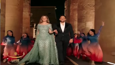 Lara Scandar and Mohamed Hamaki sing on stage in Luxor.