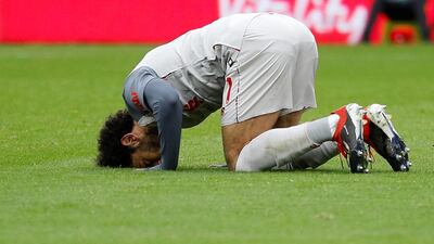 Salah celebrates scoring his first goal. Reuters