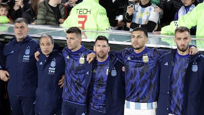 Argentina forward Lionel Messi and teammates sing the national anthem before kick off. AFP