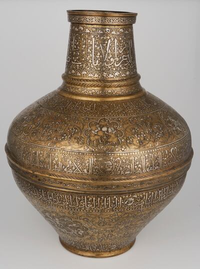 A 13th-century engraved copper vase from Syria inscribed with Kufic script. Courtesy Collections Numeriques