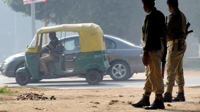 Indian security personnel stand guard in New Delhi after a bomb put the country on high alert.