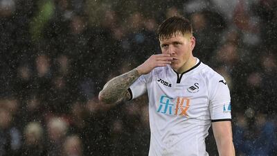 Swansea City's Alfie Mawson has been called up to the last two England squads. Rebecca Naden / Reuters