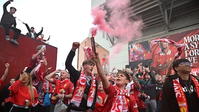 Liverpool fans prepare for the end of a victorious campaign. PA