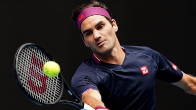 Roger Federer of Switzerland in action against Steve Johnson of the USA during a first round match on day one of the Australian Open. EPA