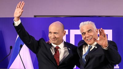 Former Israeli prime minister Naftali Bennett and Israeli opposition leader Yair Lapid announce their political union ahead of this year's general election, in Herzliya, Israel. Reuters