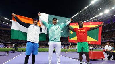 From left, Neeraj Chopra, Arshad Nadeem and Anderson Peters, who won bronze, after the Olympic javelin battle on Thursday. Getty Images
